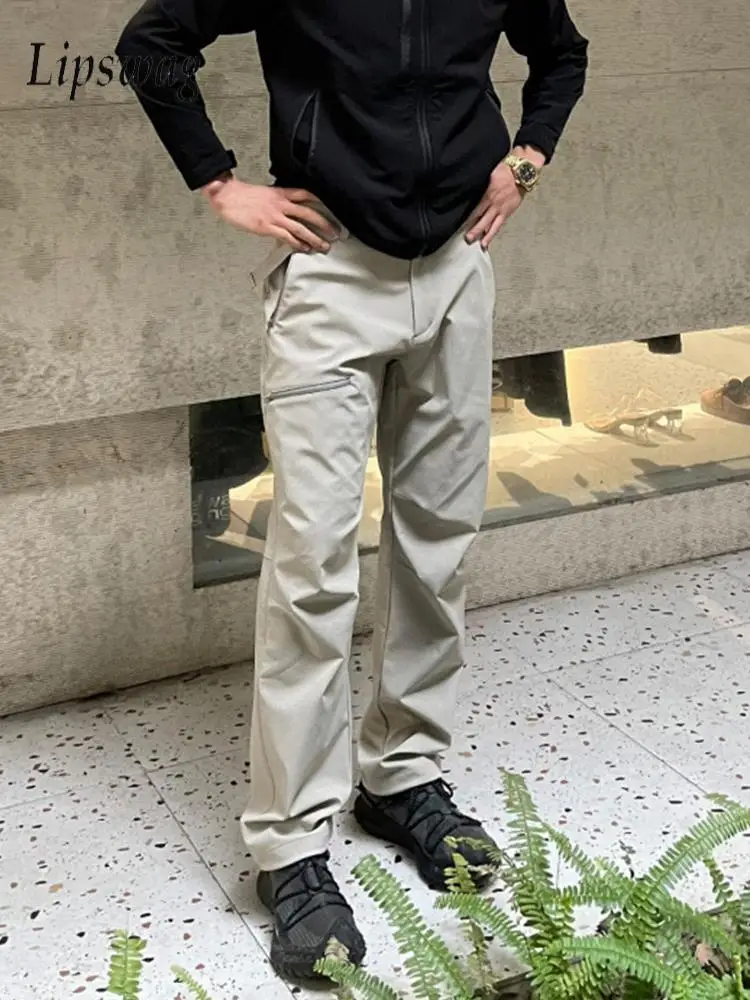 Стильные мужские прямые брюки для спорта на открытом воздухе, повседневные мужские однотонные брюки, весенне-осенняя уличная одежда, винтажные брюки на молнии
Стильные мужские прямые брюки для спорта на открытом воздухе, повседневные мужские однотонные брюки, весенне-осенняя уличная одежда, винтажные брюки на молнии