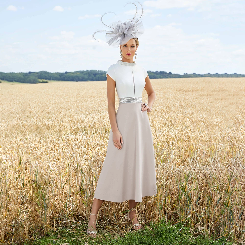 Elegant Mother of the Bride Dresses for Weddings Midi A Line Cap Sleeves Beading Belt High Collar Tea Length Wedding Guest Gowns
Elegant Mother of the Bride Dresses for Weddings Midi A Line Cap Sleeves Beading Belt High Collar Tea Length Wedding Guest Gowns