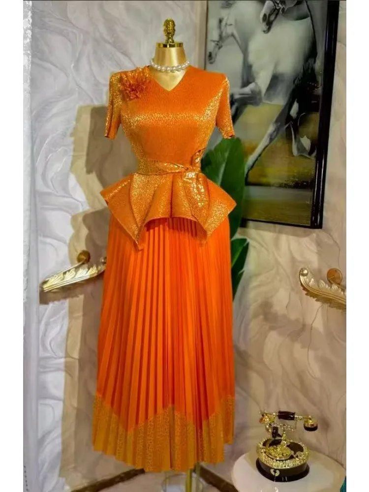 2025 Spring New Fashion Casual Suit Women's Bronzing Bud V-neck Top High Waist Long Skirt Two-piece Set
2025 Spring New Fashion Casual Suit Women's Bronzing Bud V-neck Top High Waist Long Skirt Two-piece Set