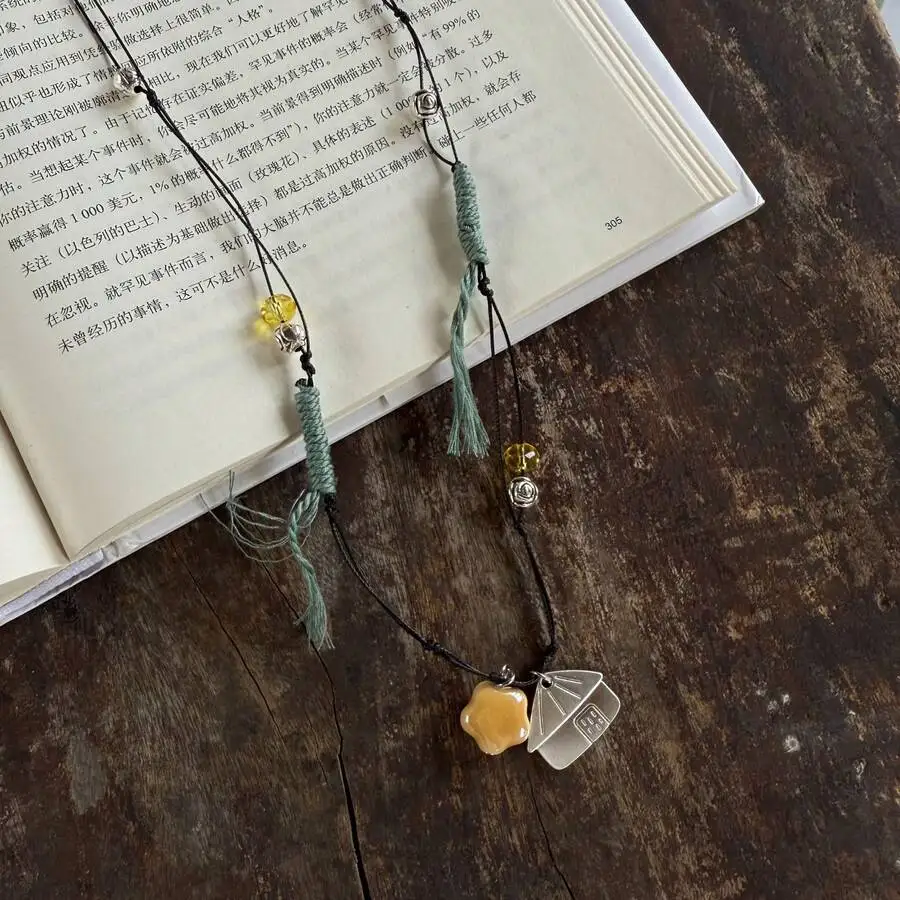 Adjustable Braided Necklace With Ceramic Star And Tent Pendant
Adjustable Braided Necklace With Ceramic Star And Tent Pendant