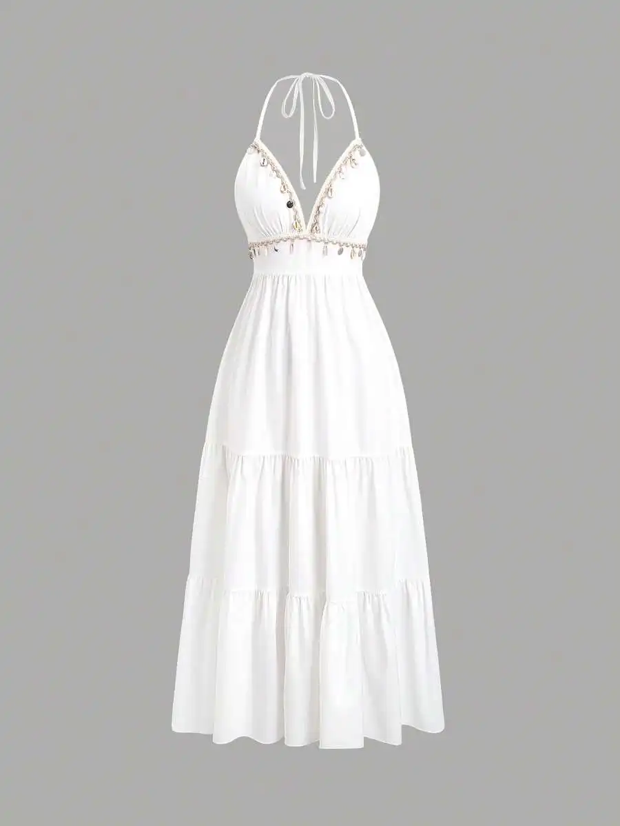 Женское белое миди-платье с воротником-халтер, многоярусной юбкой, отделкой из ракушек и завязками на талии
Женское белое миди-платье с воротником-халтер, многоярусной юбкой, отделкой из ракушек и завязками на талии