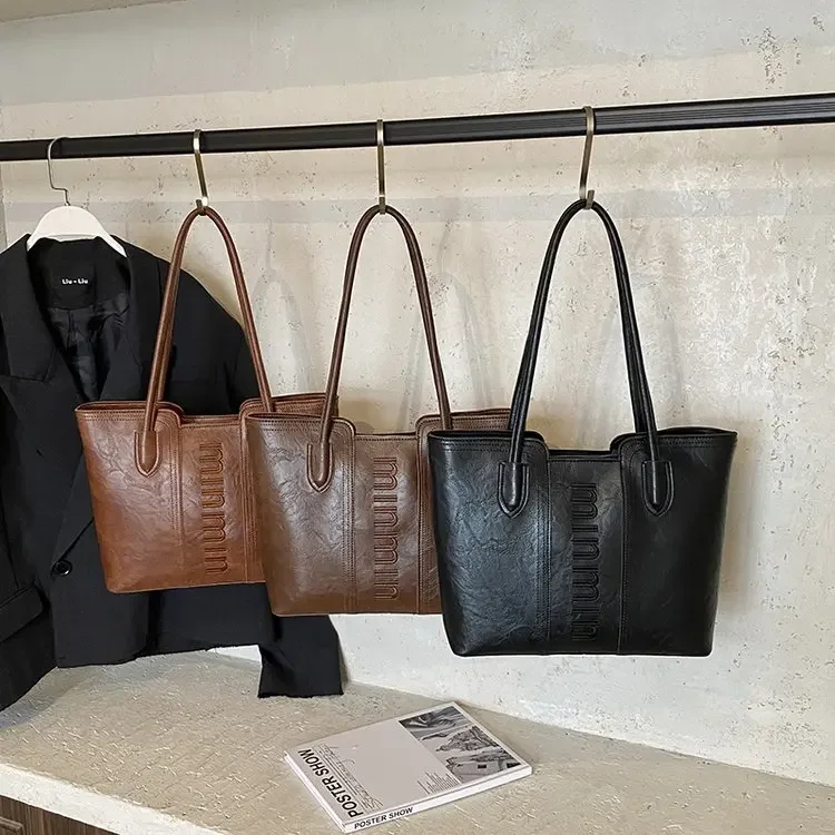 2026 High-end Simple Large-capacity Tote Bag Women's Fashion Commuter Shoulder Bag Casual Versatile Underarm Women's Bag
2026 High-end Simple Large-capacity Tote Bag Women's Fashion Commuter Shoulder Bag Casual Versatile Underarm Women's Bag