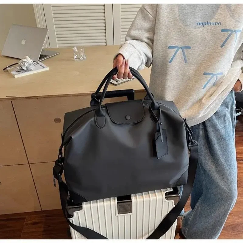 Женская легкая водонепроницаемая спортивная сумка для фитнеса большой емкости, ручная дорожная сумка из нейлонового материала, сумка для ручной клади, сумка для багажа
Женская легкая водонепроницаемая спортивная сумка для фитнеса большой емкости, ручная дорожная сумка из нейлонового материала, сумка для ручной клади, сумка для багажа