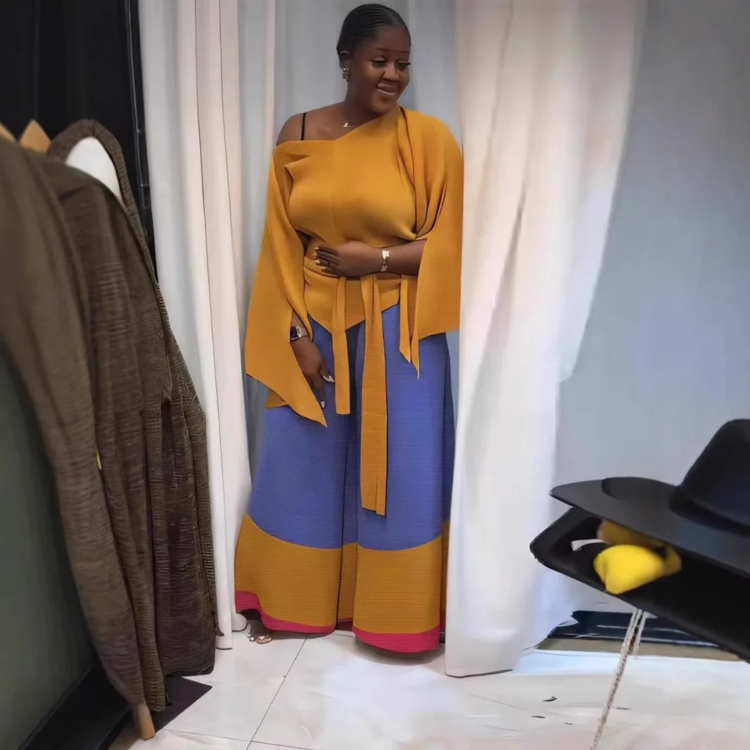 Top quality ISSEYS MIYAKES pleated fashion loose irregular top color blocking wide leg pants plus size two-piece set
Top quality ISSEYS MIYAKES pleated fashion loose irregular top color blocking wide leg pants plus size two-piece set