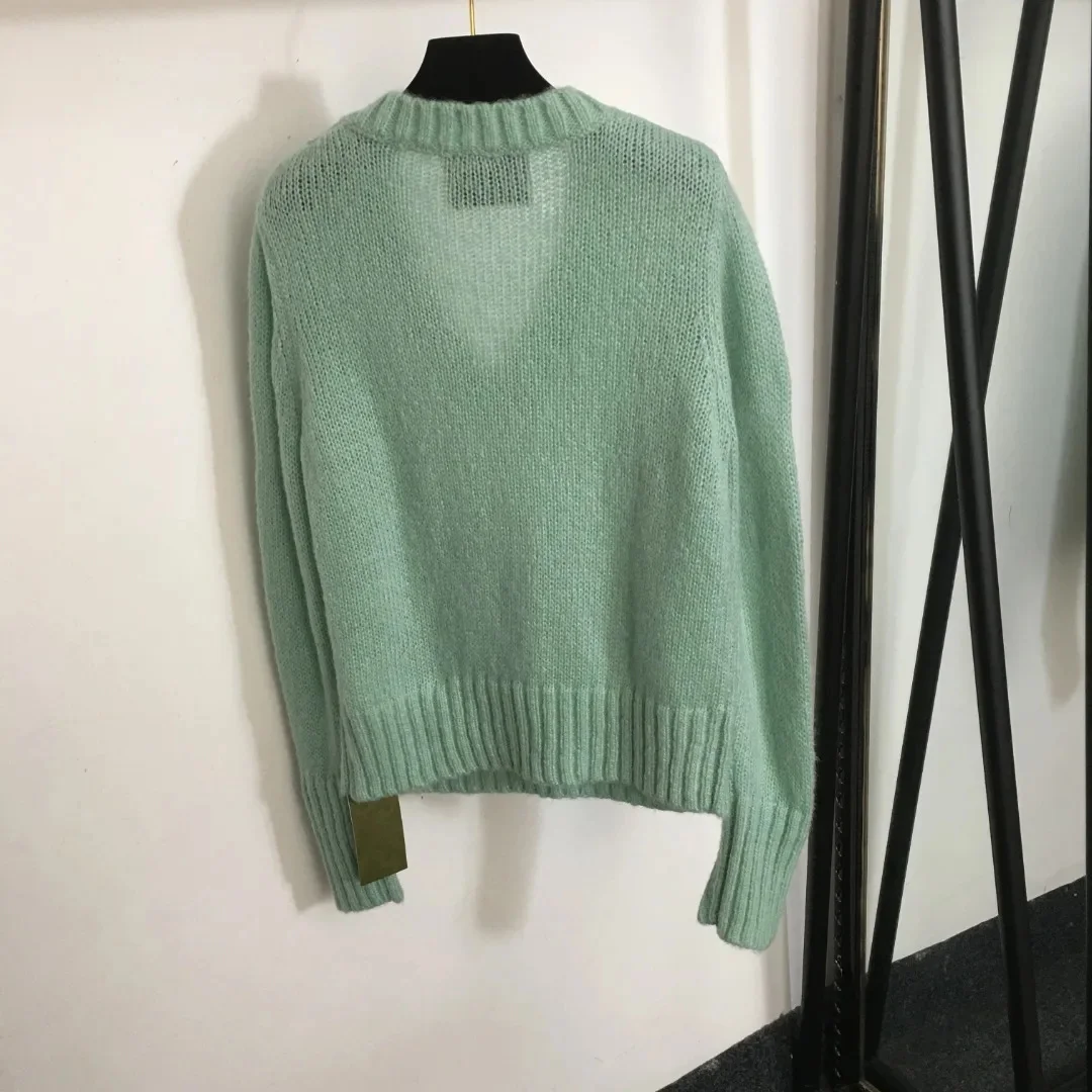 Long sleeved V-neck mohair sweater knitted sweater for women's autumn and winter new top 9668
Long sleeved V-neck mohair sweater knitted sweater for women's autumn and winter new top 9668
