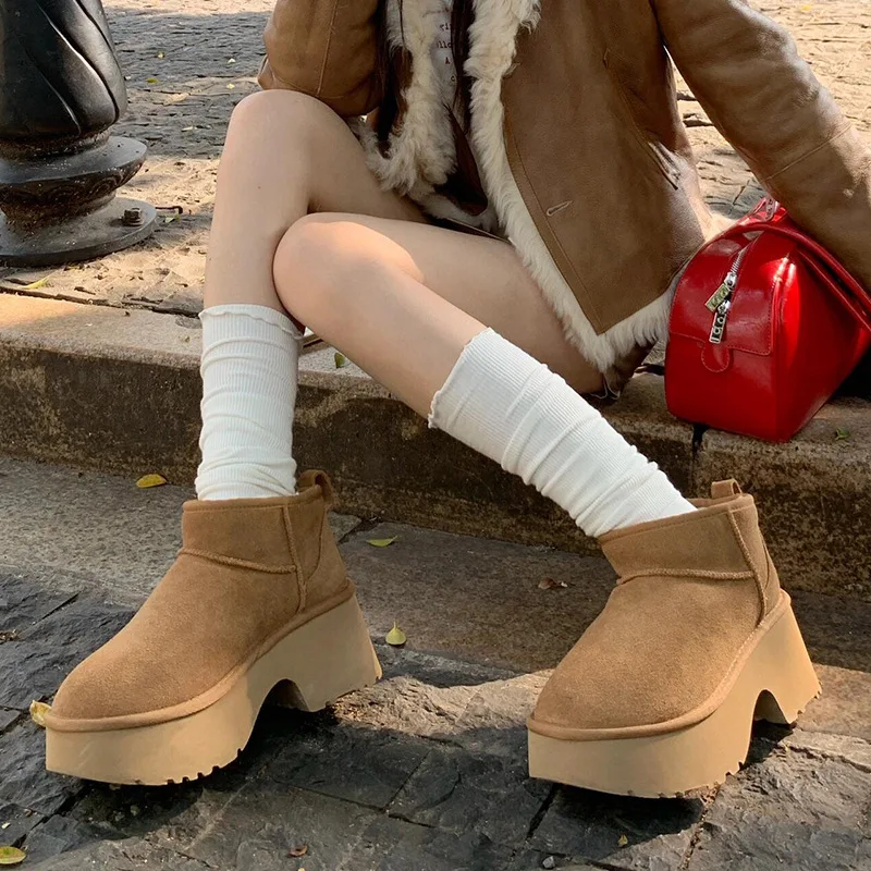 Winter and Spring Retro Simple Commuting Pure Color Tall Slope Heel Thick Bottom Mermaid Classic Mini Boots
Winter and Spring Retro Simple Commuting Pure Color Tall Slope Heel Thick Bottom Mermaid Classic Mini Boots