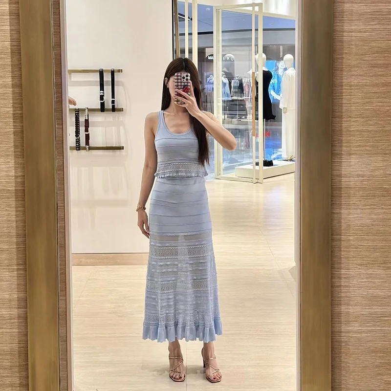 Summer Fashion Knitted Ruffle Hollow out round Neck Vest And Long Skirt Set Women's Elegant Style No Sleeve Chinese Made
Summer Fashion Knitted Ruffle Hollow out round Neck Vest And Long Skirt Set Women's Elegant Style No Sleeve Chinese Made