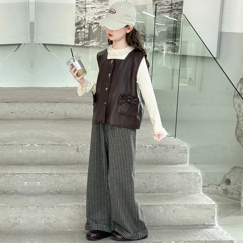 Junior Girls 3pcs Sets Autumn Lace Round Neck Undershirt+Bowknot Leather Vest+Striped Wide Leg Pant Children Girls Outfit
Junior Girls 3pcs Sets Autumn Lace Round Neck Undershirt+Bowknot Leather Vest+Striped Wide Leg Pant Children Girls Outfit
