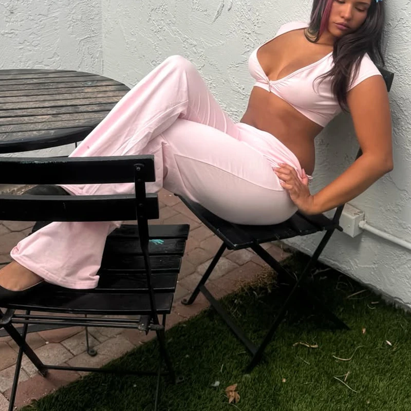 Women's Y2k Solid Color Outfits Set Short Sleeve Button V Neck Cropped Top with Elastic Fold Over Waist Long Pants
Women's Y2k Solid Color Outfits Set Short Sleeve Button V Neck Cropped Top with Elastic Fold Over Waist Long Pants