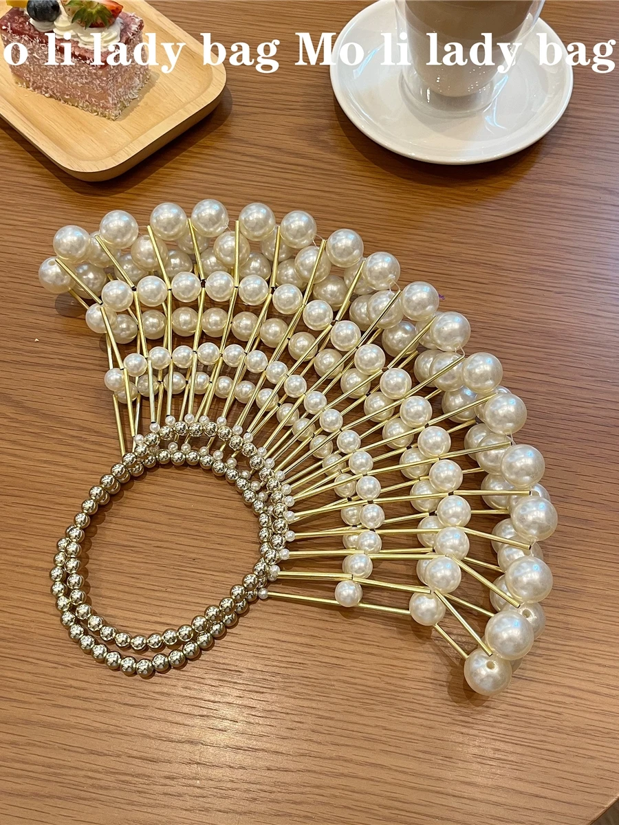 Handmade Beaded Pearl Hollow out Fan Design Crossbody Handbag for Women Elegant Lady Vintage Style Woven Bag Casual Handbag
Handmade Beaded Pearl Hollow out Fan Design Crossbody Handbag for Women Elegant Lady Vintage Style Woven Bag Casual Handbag