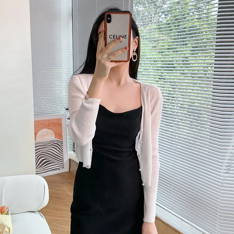 Women's Ice Silk Knitted Shawl Lightweight Summer Outerwear with Strap Vest Air Conditioning Cardigan Short Sleeve Slim Fit
Women's Ice Silk Knitted Shawl Lightweight Summer Outerwear with Strap Vest Air Conditioning Cardigan Short Sleeve Slim Fit