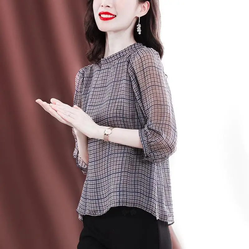 Shirt female 2023 summer new fashion seven -point sleeve plaid print high -end casual thin chiffon shirt top female clothing
Shirt female 2023 summer new fashion seven -point sleeve plaid print high -end casual thin chiffon shirt top female clothing