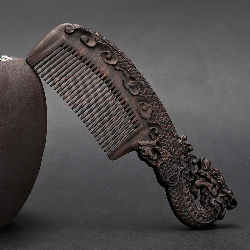 Handcrafted Ebony Detangling Comb - Dual-Side Carved Design, Fine Teeth for Smooth Styling, Luxury Gift
Handcrafted Ebony Detangling Comb - Dual-Side Carved Design, Fine Teeth for Smooth Styling, Luxury Gift