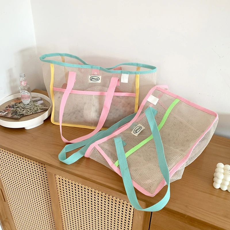 Ladies Summer Transparent Mesh Breathable Handbag Outdoor Beach Shower Handbag Large Capacity Beach Bags Portable Swimming Tote
Ladies Summer Transparent Mesh Breathable Handbag Outdoor Beach Shower Handbag Large Capacity Beach Bags Portable Swimming Tote