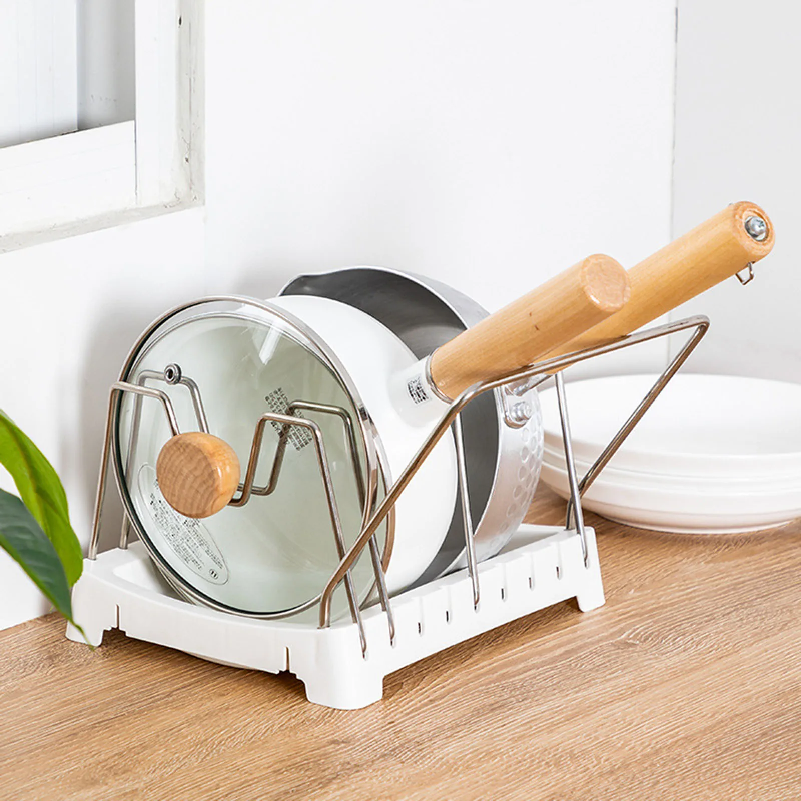 1pcs Thickened Plastic Pot Lid Holder Adjustable Kitchen Storage Rack Modern Utensil Organizer Household Cookware Shelf 
1pcs Thickened Plastic Pot Lid Holder Adjustable Kitchen Storage Rack Modern Utensil Organizer Household Cookware Shelf