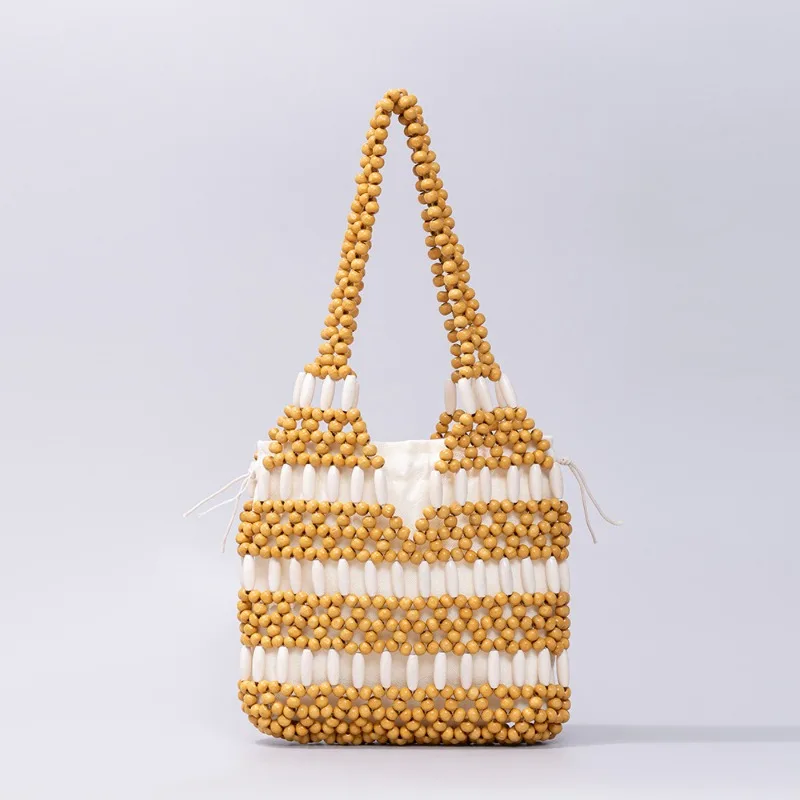 Bohemian Beige White Striped Tote Bag Handmade Hollow Wood Beaded Woven Shoulder Bag Summer Vacation Beach Handbag and Purses
Bohemian Beige White Striped Tote Bag Handmade Hollow Wood Beaded Woven Shoulder Bag Summer Vacation Beach Handbag and Purses