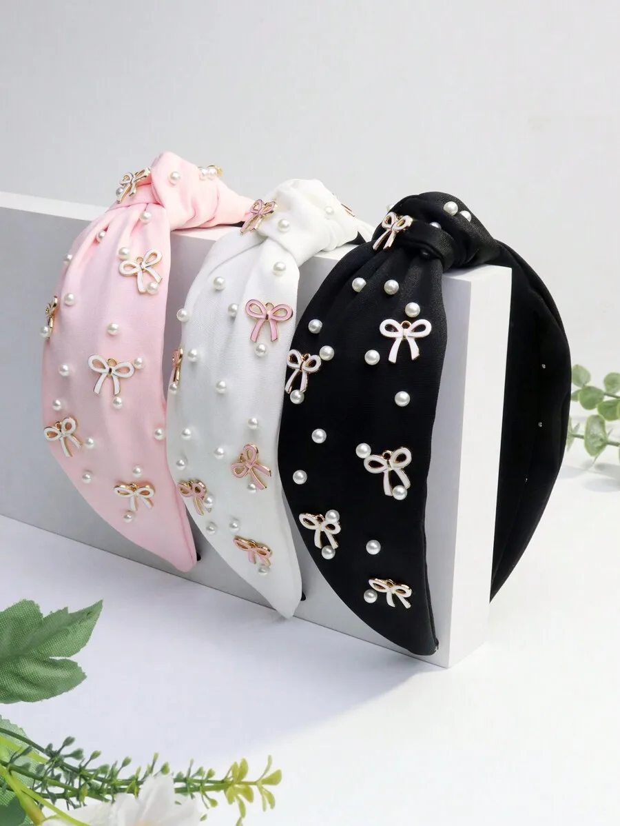 Elegant Solid Color Fabric Knot Headband For Women With Pearl And Bow Embellishments In Pink, White, Black
Elegant Solid Color Fabric Knot Headband For Women With Pearl And Bow Embellishments In Pink, White, Black