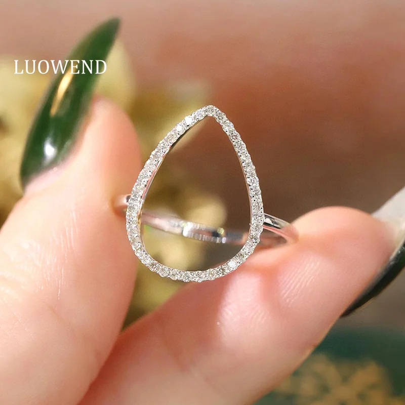 LUOWEND 100% кольца из белого/желтого золота 18 карат, обручальное кольцо с настоящим натуральным бриллиантом, модное свадебное украшение в стиле INS для женщин
LUOWEND 100% кольца из белого/желтого золота 18 карат, обручальное кольцо с настоящим натуральным бриллиантом, модное свадебное украшение в стиле INS для женщин