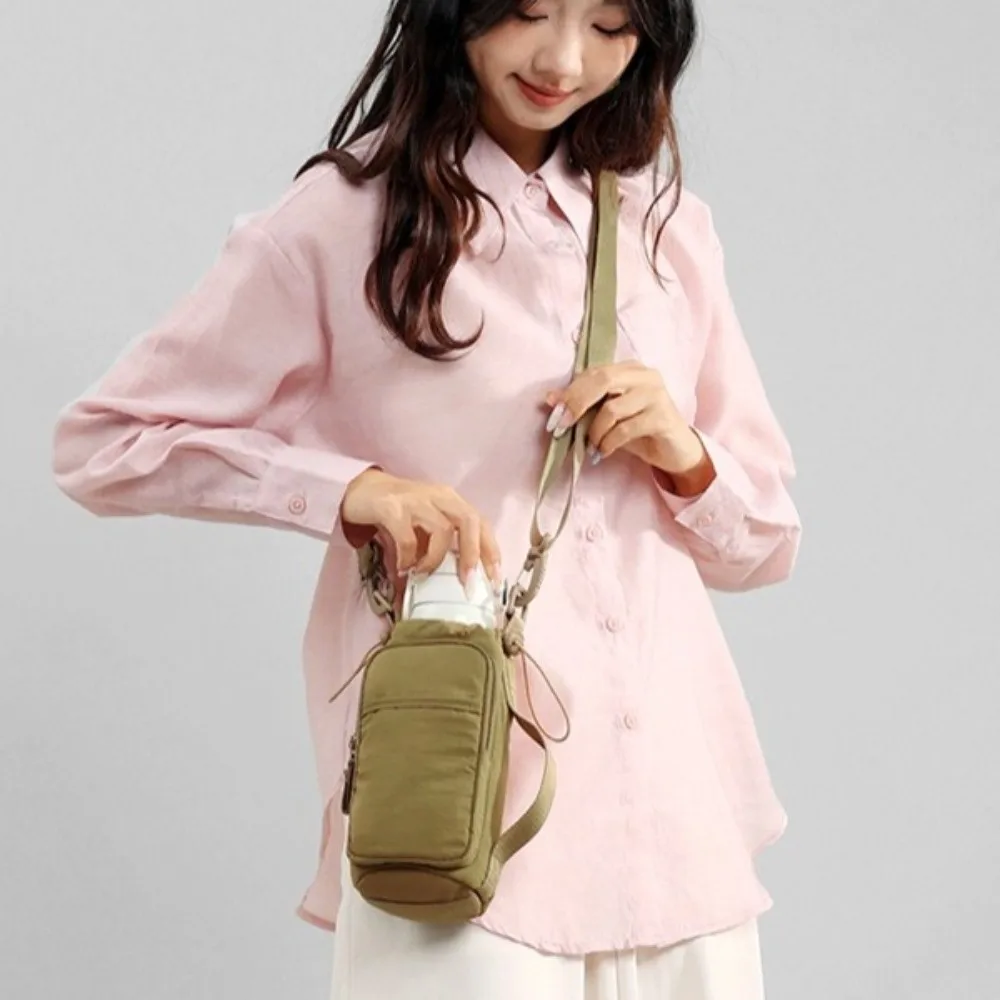Multifunctional Crossbody Phone Pouch Nylon Handhold Water Bottle Storage Bag Large Capacity Square Women's Fitness Bag Outdoor
Multifunctional Crossbody Phone Pouch Nylon Handhold Water Bottle Storage Bag Large Capacity Square Women's Fitness Bag Outdoor