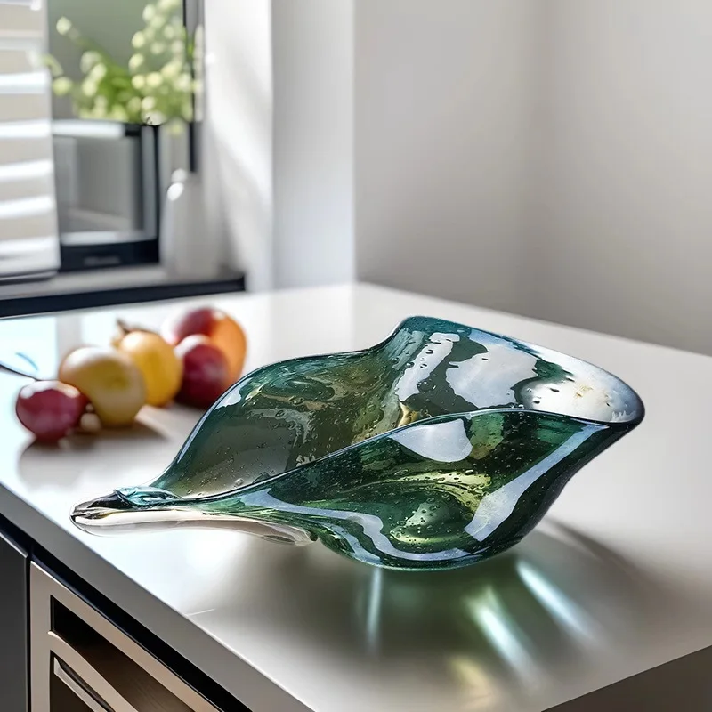 Glass fruit plate special-shaped household large candy plate high-end light luxury ornament handicrafts
Glass fruit plate special-shaped household large candy plate high-end light luxury ornament handicrafts