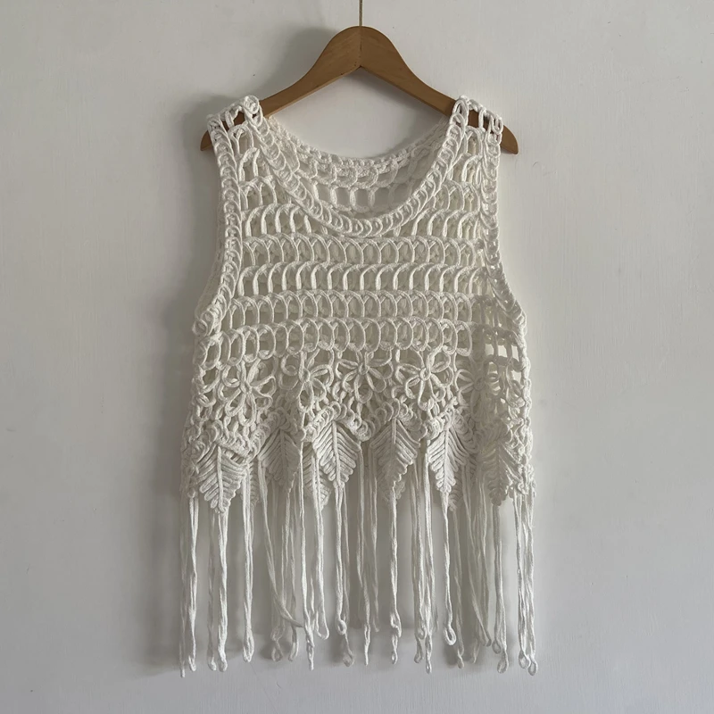 2025 Summer Bohemian Beach Mesh Knitted Tank Top Sleeveless Tassel Hook Flower Hollow Blouse Fashion Women Shirt 
2025 Summer Bohemian Beach Mesh Knitted Tank Top Sleeveless Tassel Hook Flower Hollow Blouse Fashion Women Shirt