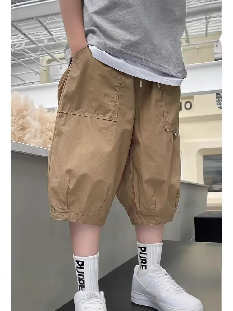 2025 Boys' Summer Thin Shorts 2025 New Korean Edition Fashionable Teenage Children's Summer Casual Solid Color Loose Pants
2025 Boys' Summer Thin Shorts 2025 New Korean Edition Fashionable Teenage Children's Summer Casual Solid Color Loose Pants
