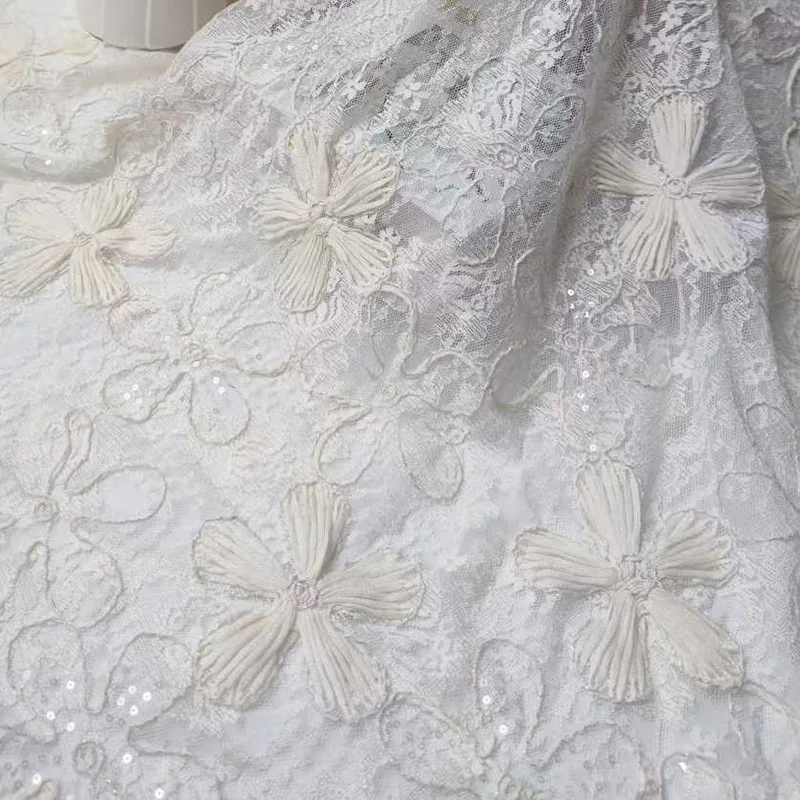 Gorgeous 3D floral embroidered lace mesh jacquard fabric, featuring embroidery and sequins for wedding dress designer fabrics
Gorgeous 3D floral embroidered lace mesh jacquard fabric, featuring embroidery and sequins for wedding dress designer fabrics
