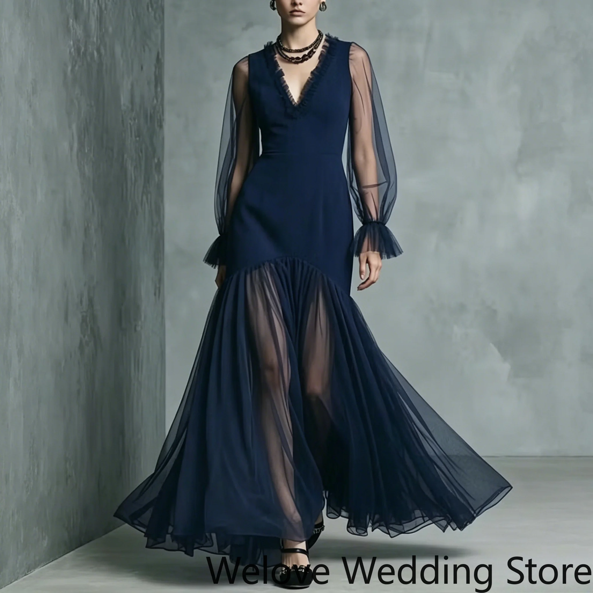 Customized Elegant Navy Blue Formal Evening Gown Featuring a deep V-neck, sheer tulle puff long sleeves with ruffled cuffs
Customized Elegant Navy Blue Formal Evening Gown Featuring a deep V-neck, sheer tulle puff long sleeves with ruffled cuffs
