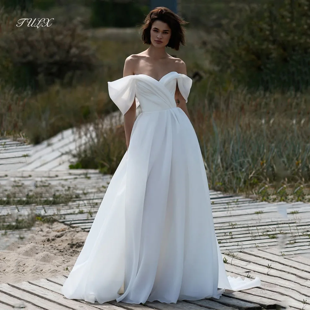 TULX Elegant Ivory Organza Wedding Dresses V Neck Off Shoulder Bridal Gowns A line Floor Length Robe De Mariée Customized 2026
TULX Elegant Ivory Organza Wedding Dresses V Neck Off Shoulder Bridal Gowns A line Floor Length Robe De Mariée Customized 2026