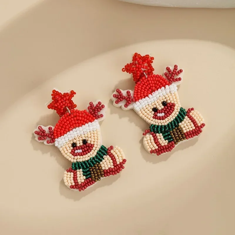 Beaded earrings Christmas Fabric art Christmas tree Elk Snowman Hand knitting Bohemia Design Fashion Simple Rice bead earrings
Beaded earrings Christmas Fabric art Christmas tree Elk Snowman Hand knitting Bohemia Design Fashion Simple Rice bead earrings