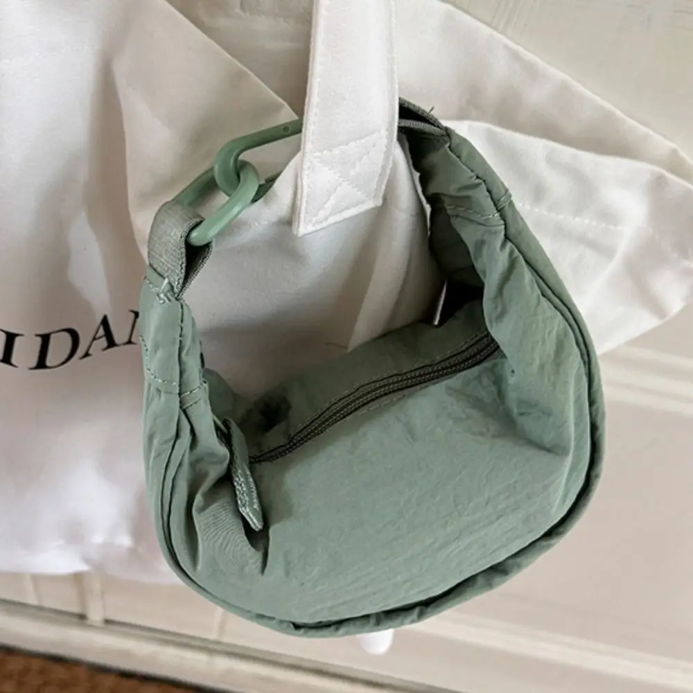 Sweet Korean Style Nylon Crossbody Bag Lightweight Handbag Mini Dumpling Bag Solid Color Oxford Cloth Shoulder Bag Outdoor
Sweet Korean Style Nylon Crossbody Bag Lightweight Handbag Mini Dumpling Bag Solid Color Oxford Cloth Shoulder Bag Outdoor