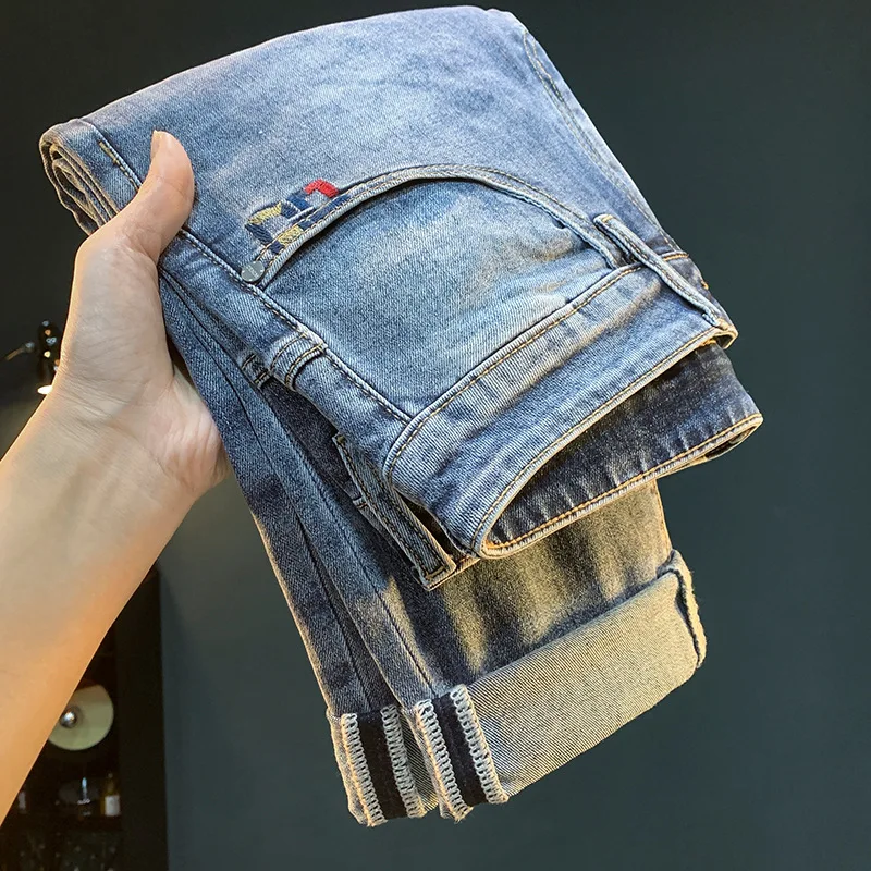 High end light luxury men's jeans 2025 spring trend embroidered elastic denim small foot casual pants
High end light luxury men's jeans 2025 spring trend embroidered elastic denim small foot casual pants