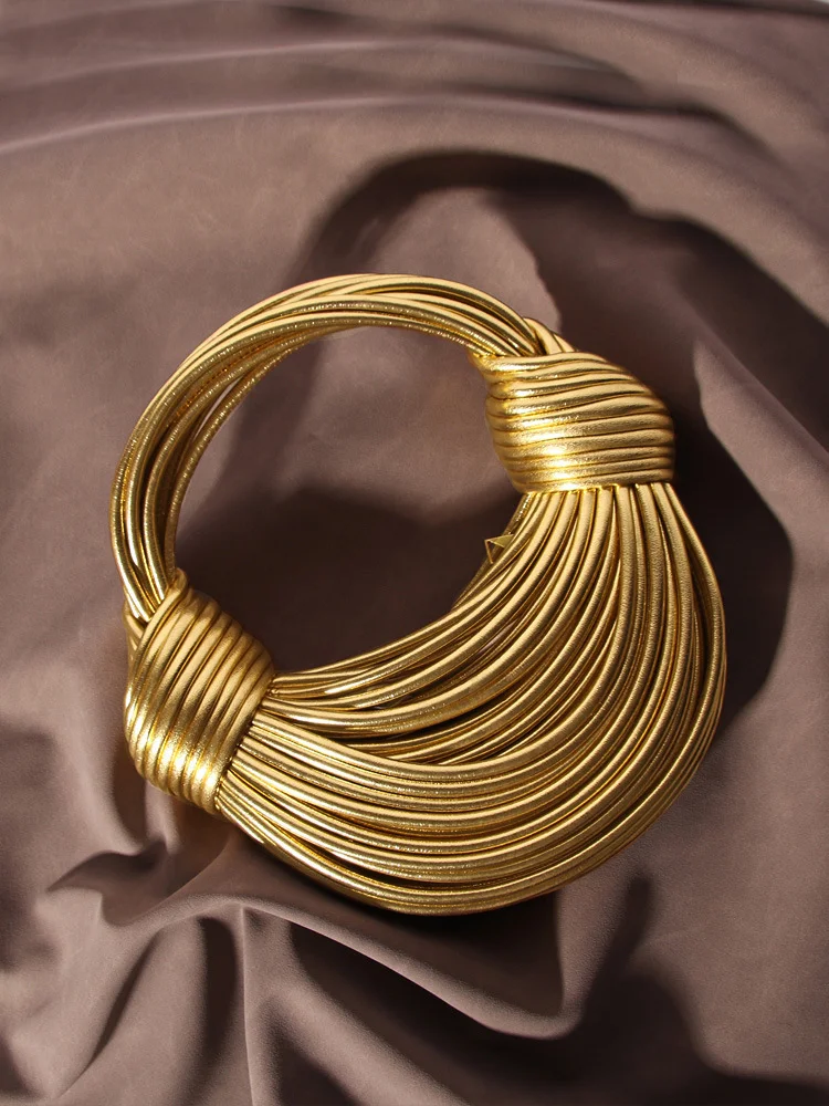 Ladies' new gold luxury designer brand hand woven noodle bag, knot drawstring shoulder bag, evening clutch bag
Ladies' new gold luxury designer brand hand woven noodle bag, knot drawstring shoulder bag, evening clutch bag