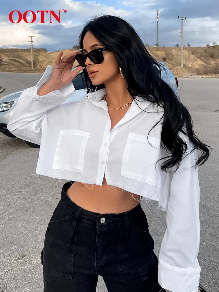 Уличный белый укороченный топ OOTN, женская блузка 2024, модные повседневные хлопковые рубашки с отложным воротником, сексуальные весенние топы на пуговицах с длинным рукавом
Уличный белый укороченный топ OOTN, женская блузка 2024, модные повседневные хлопковые рубашки с отложным воротником, сексуальные весенние топы на пуговицах с длинным рукавом