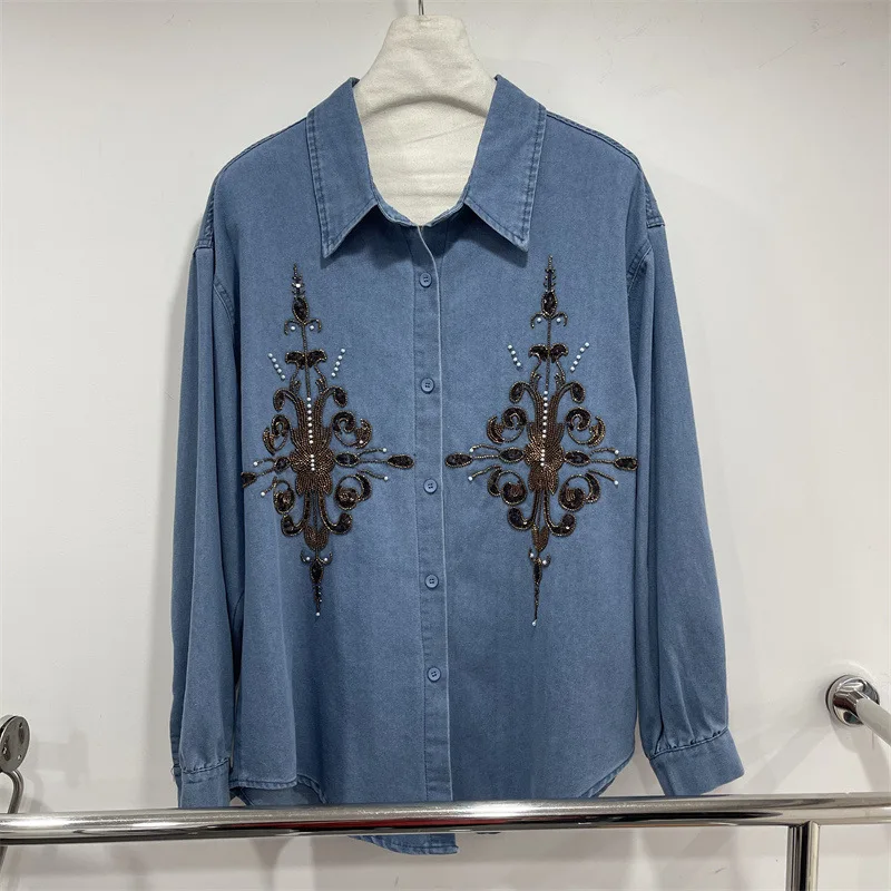Женские джинсовые рубашки SuperAen с вышивкой и пайетками, весна 2026, новая коллекция, ретро-стиль, свободные, элегантные, на одной пуговице
Женские джинсовые рубашки SuperAen с вышивкой и пайетками, весна 2026, новая коллекция, ретро-стиль, свободные, элегантные, на одной пуговице