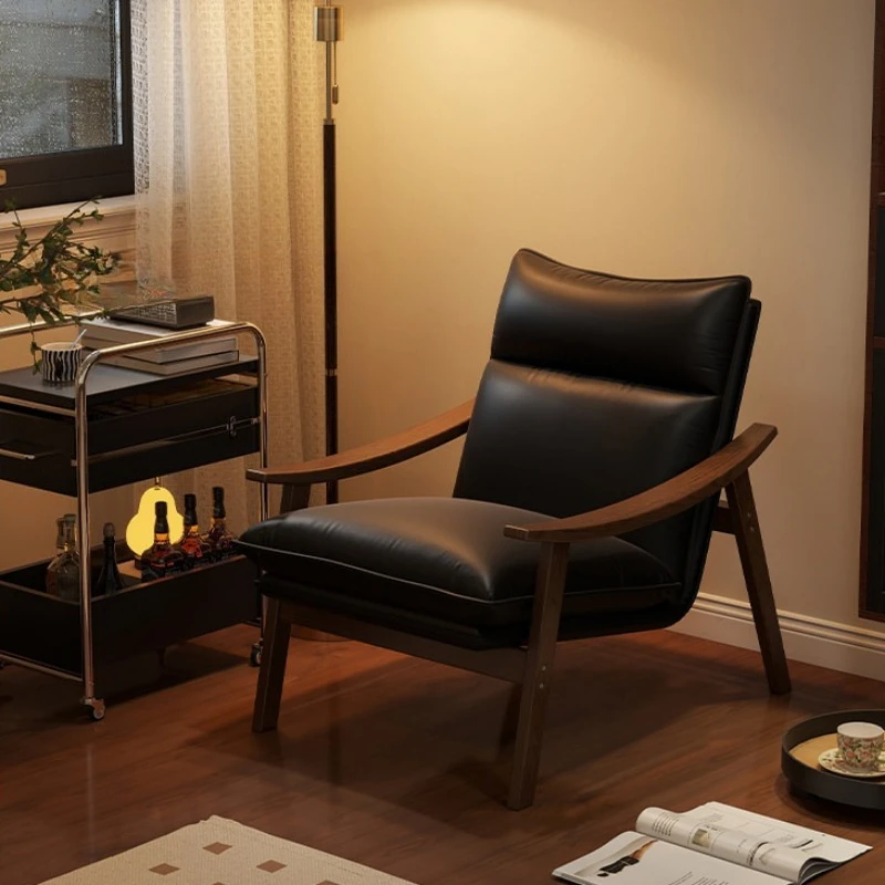 Retro single armchair living room leisure black leather backrest chair household simple butacas de dormitorios home furniture
Retro single armchair living room leisure black leather backrest chair household simple butacas de dormitorios home furniture
