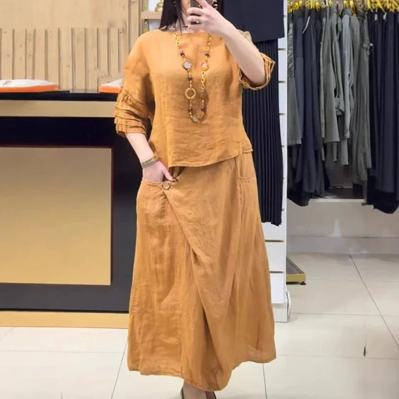 Womens Casual Solid Color Linen Dress Set Vintage 2025 O Neck Half Sleeve Top Pullover & A-Line Skirts Loose 2 Piece Outfit
Womens Casual Solid Color Linen Dress Set Vintage 2025 O Neck Half Sleeve Top Pullover & A-Line Skirts Loose 2 Piece Outfit