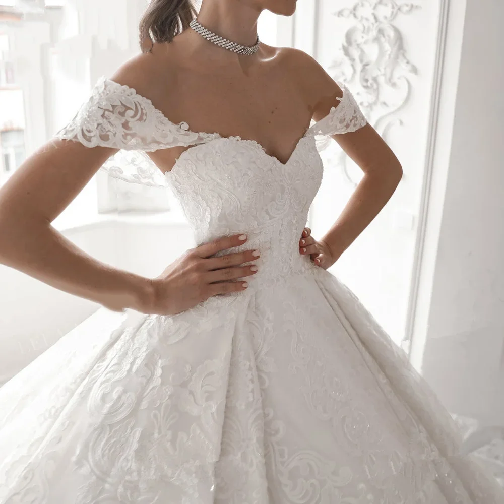 Customized Elegant Ball Gown Lace Appliques Wedding Dresses Off the Shoulder Sequined Bridal Gowns with Cathedral Train Vestido
Customized Elegant Ball Gown Lace Appliques Wedding Dresses Off the Shoulder Sequined Bridal Gowns with Cathedral Train Vestido