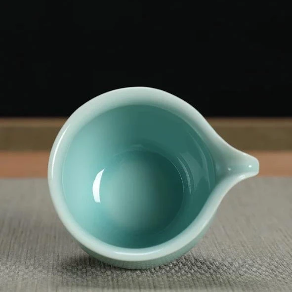 Longquan Celadon Younger Brother Kiln Pink Green Porcelain Fair Cup Kungfu Tea Set Ceramic Tea Divider Even Cup Chen Xiang Yuan
Longquan Celadon Younger Brother Kiln Pink Green Porcelain Fair Cup Kungfu Tea Set Ceramic Tea Divider Even Cup Chen Xiang Yuan