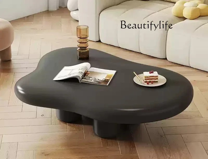 a Coffee table Nordic home living room simple modern small apartment special-shaped table cream style designer
a Coffee table Nordic home living room simple modern small apartment special-shaped table cream style designer