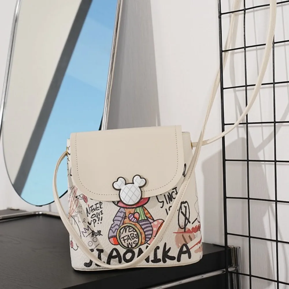 Cute Graffiti Bucket Bag Lightweight Large Capacity Shoulder Bag Versatile PU Crossbody Bag
Cute Graffiti Bucket Bag Lightweight Large Capacity Shoulder Bag Versatile PU Crossbody Bag