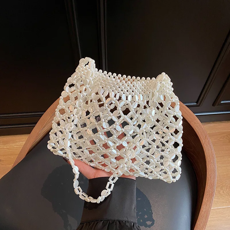 Niche Acrylic Handmade Beaded Woven Bag Female Niche Spice Girl Out of The Street Underarm Fishing Net Versatile Shoulder Bag
Niche Acrylic Handmade Beaded Woven Bag Female Niche Spice Girl Out of The Street Underarm Fishing Net Versatile Shoulder Bag