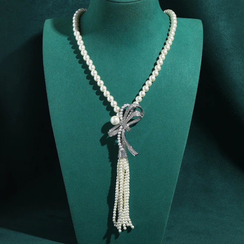 Vintage Pearl Beads Long Tassel Pendent Necklaces Silver Color Rhinestone Bow Unique Design Brand Jewelry Women Art Deco Wedding
Vintage Pearl Beads Long Tassel Pendent Necklaces Silver Color Rhinestone Bow Unique Design Brand Jewelry Women Art Deco Wedding