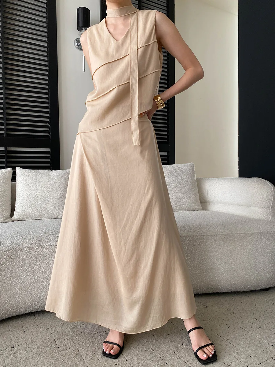 Summer women's casual solid color irregular V-neck hanging neck ribbon sleeveless shirt half skirt set
Summer women's casual solid color irregular V-neck hanging neck ribbon sleeveless shirt half skirt set