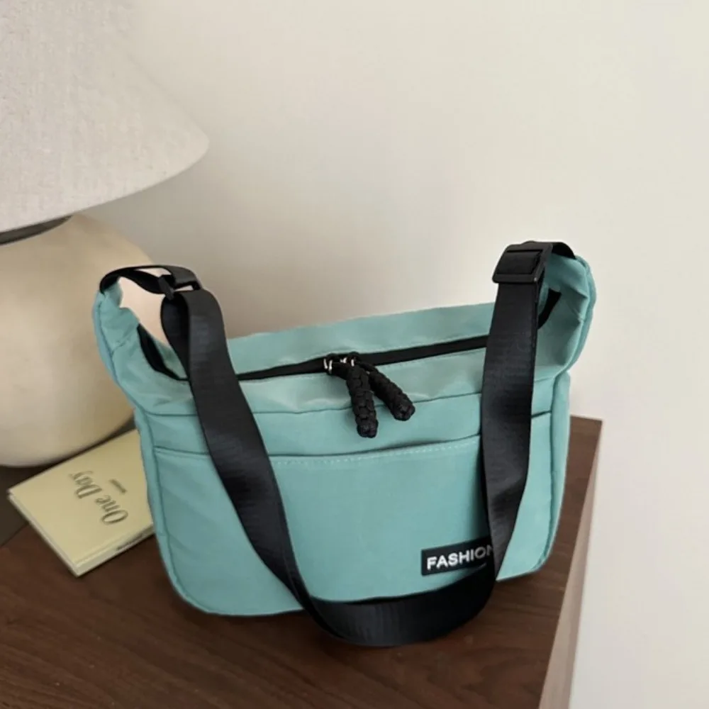 Fashion Korean Style Square Message Bag Large Capacity Solid Color Nylon Crossbody Bag Causal Sports Shoulder Bag Female
Fashion Korean Style Square Message Bag Large Capacity Solid Color Nylon Crossbody Bag Causal Sports Shoulder Bag Female