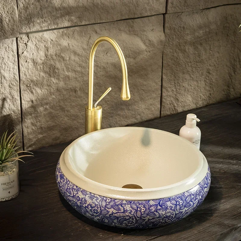 Уличная круглая раковина Цзиндэчжэнь в стиле ретро, сине-белая столешница, керамический балкон, ванная комната, одинарная
Уличная круглая раковина Цзиндэчжэнь в стиле ретро, сине-белая столешница, керамический балкон, ванная комната, одинарная