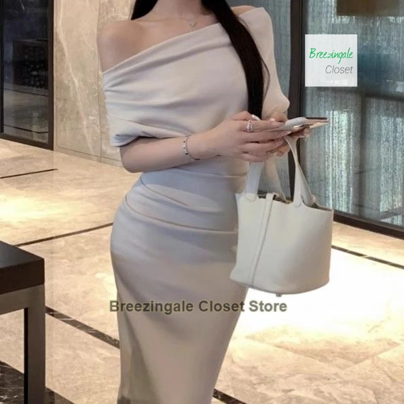 French temperament swing collar irregular strapless dress women's summer diagonal shoulder new slim high-grade pleated dress
French temperament swing collar irregular strapless dress women's summer diagonal shoulder new slim high-grade pleated dress