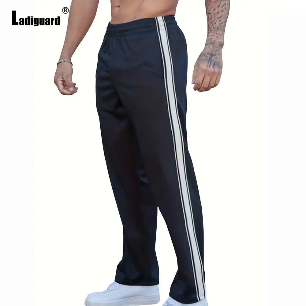 2025 Men's Stand Pocket Casual Run Pants Model Stripe Trouser Plus Size Mens Casual Straight Pants Male Ankle-Length Bottoms New
2025 Men's Stand Pocket Casual Run Pants Model Stripe Trouser Plus Size Mens Casual Straight Pants Male Ankle-Length Bottoms New