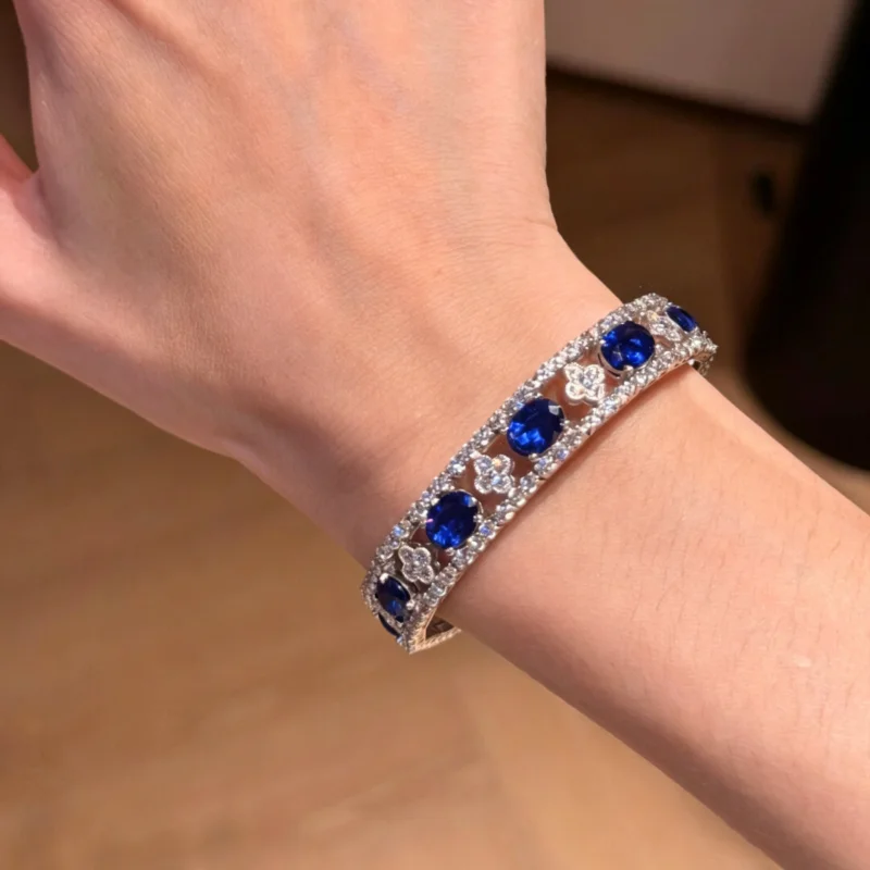 Bellux 925 Silver Hollow Bracelet For Women Oval Sapphire White CZ Diamonds The Blue Danube Unique Design Jewelry Bracelet
Bellux 925 Silver Hollow Bracelet For Women Oval Sapphire White CZ Diamonds The Blue Danube Unique Design Jewelry Bracelet