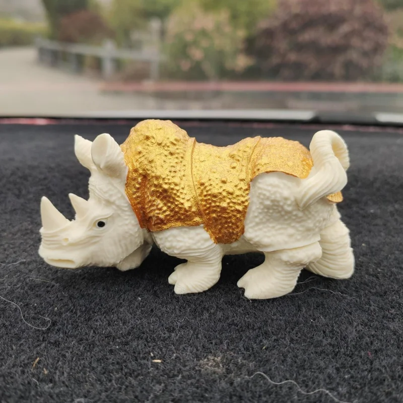 Ivory Nut Carved Drawing Gold-Plated Large Rhinoceros9.5*5.5*3.8cmAnimal Tea Ornaments Desktop Crafts Ornaments
Ivory Nut Carved Drawing Gold-Plated Large Rhinoceros9.5*5.5*3.8cmAnimal Tea Ornaments Desktop Crafts Ornaments